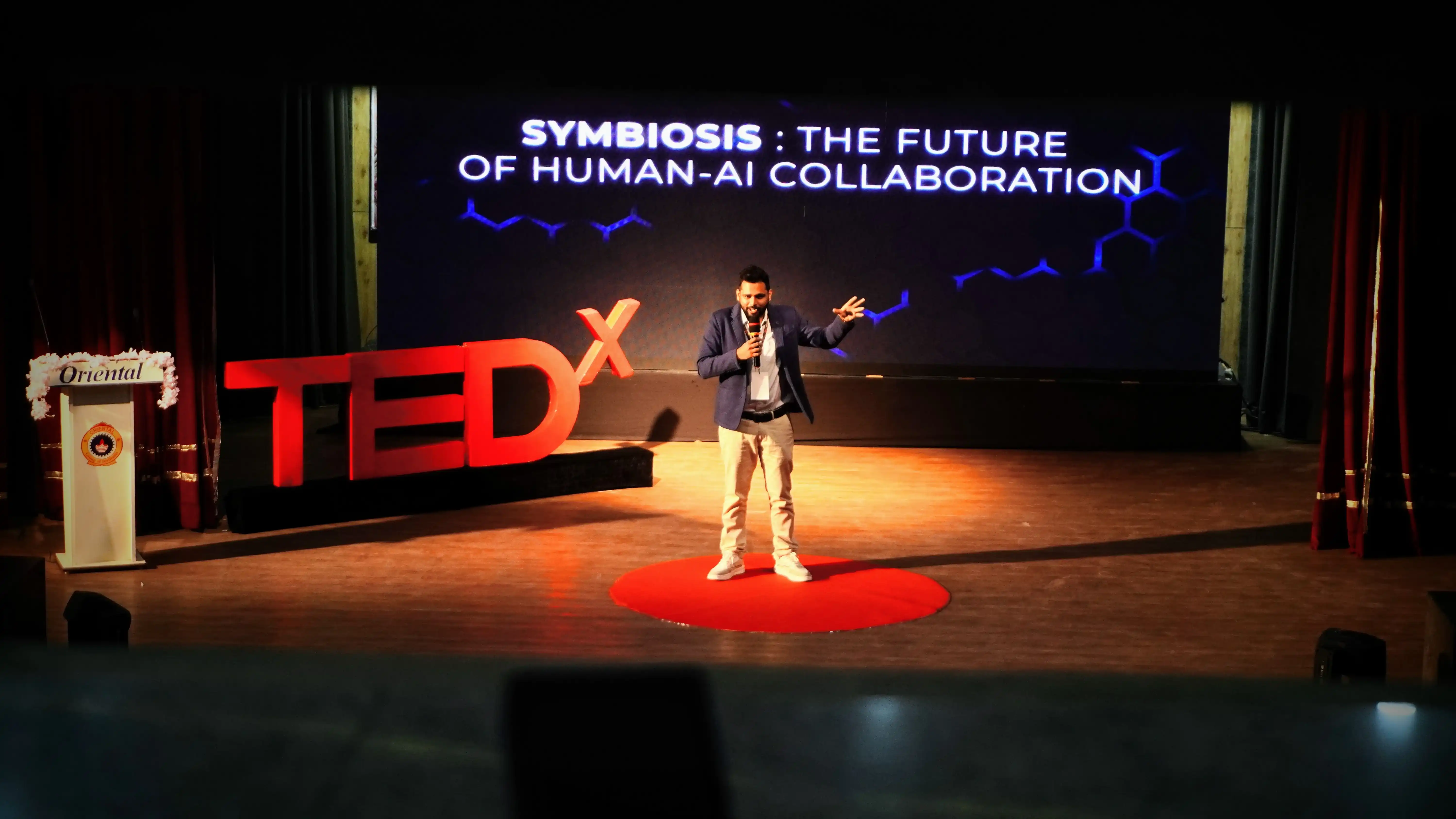 Ritwik Joshi, leading AI Keynote Speaker, discussing the future of humanoid robotics on the TEDx stage.