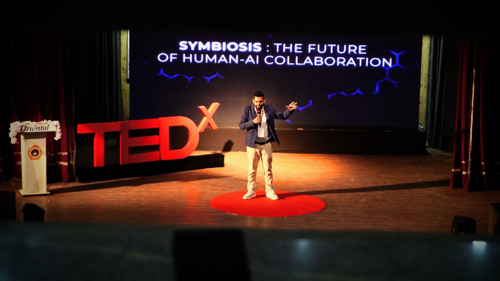 Ritwik on TEDxOIST Stage