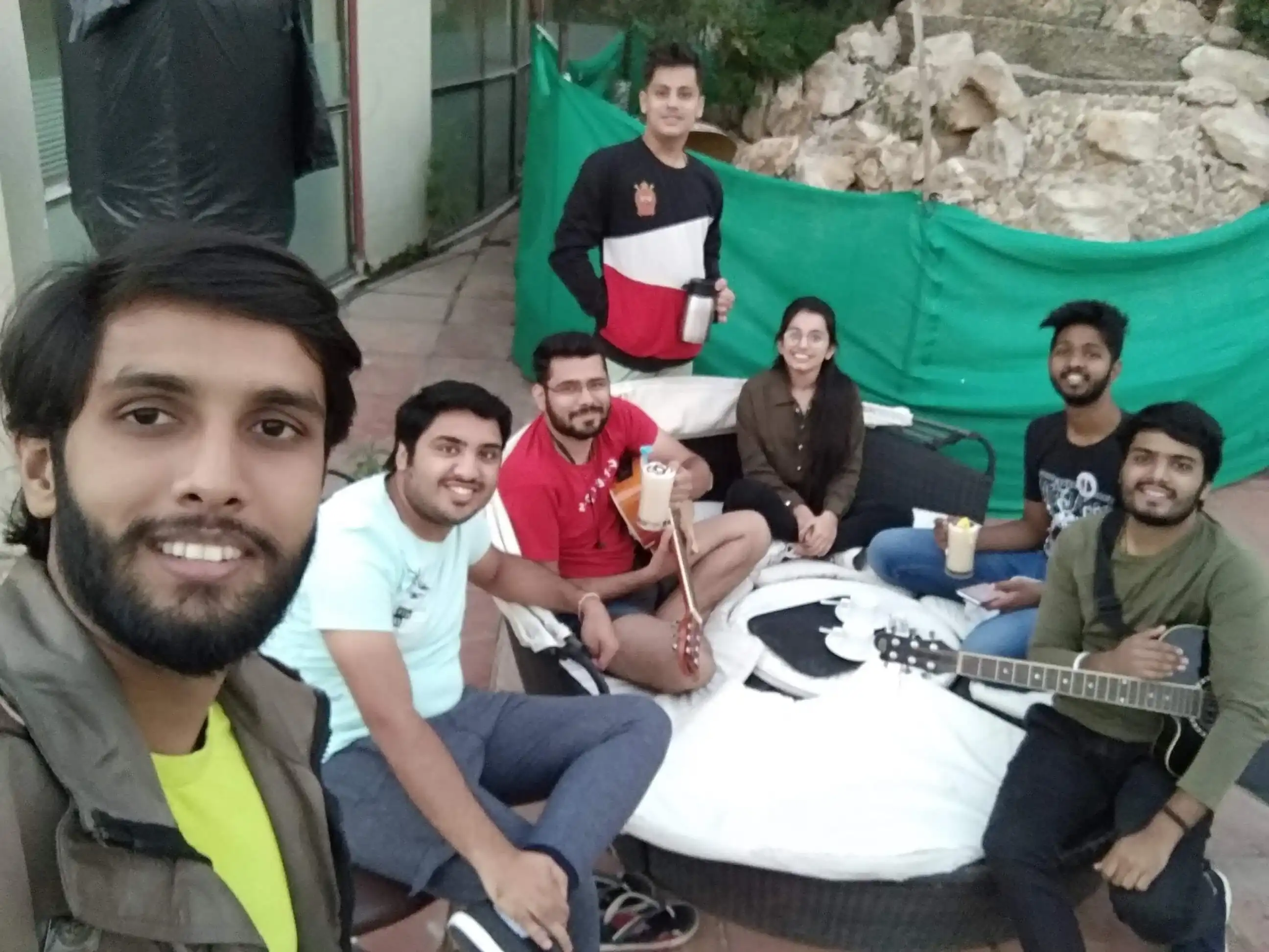 Ritwik Joshi alongside the Botosynthesis team during a corporate retreat at a scenic resort.