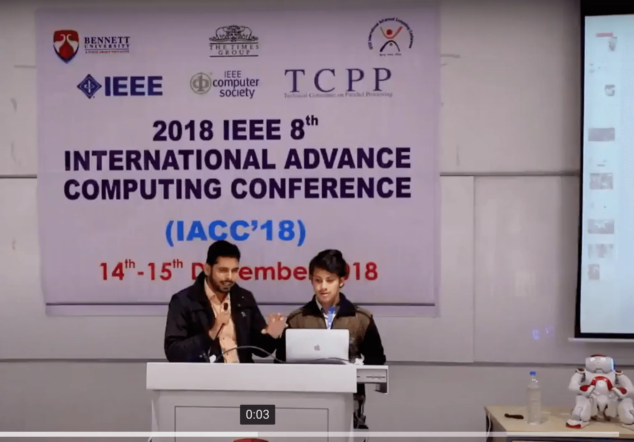 Ritwik and Vansh explaining Nao Robot at IEEE Conference